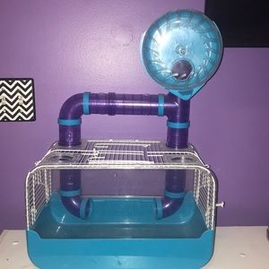 This hamster cage is used but is in good condition
